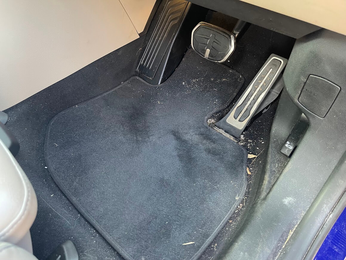 BMW iX1 driver footwell before interior detailing - Wittering, Peterborough