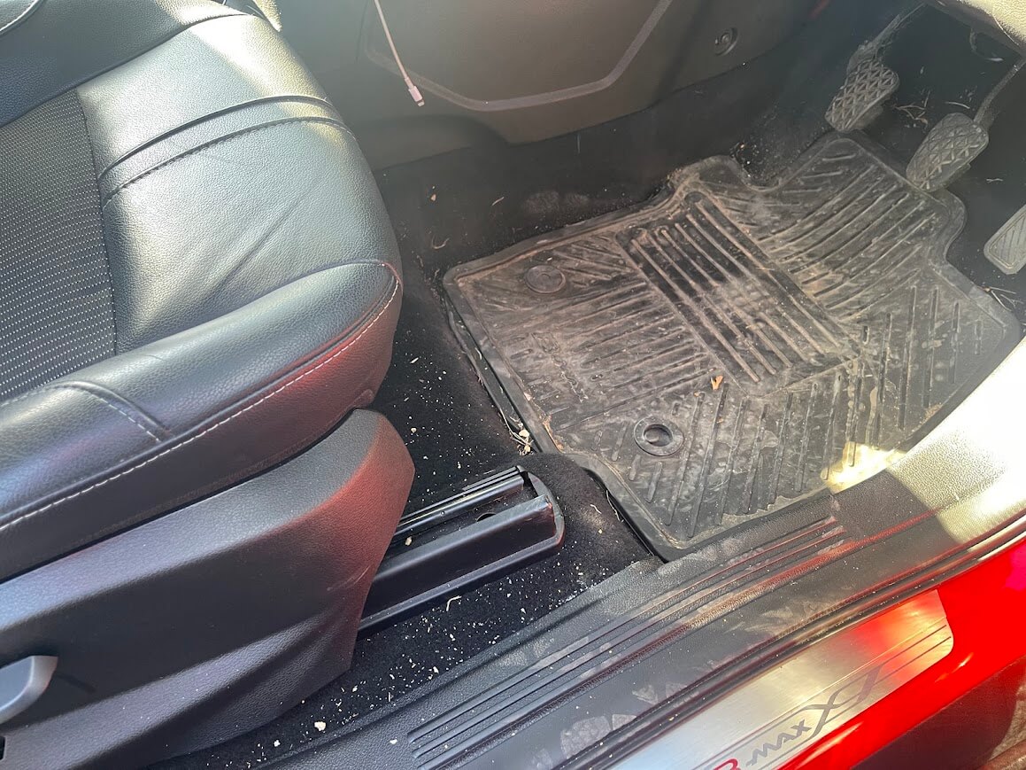 Ford B Max driver's footwell before interior detailing in Peterborough