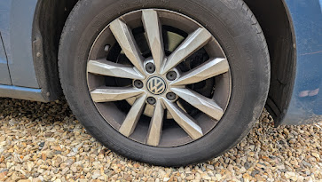 VW Touran alloy wheel before detailing in St Ives, Cambridgeshire
